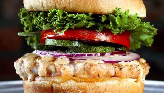 Kitchen Sync signature dishes Shrimp BurgerBanh Mi SaladPork Chop